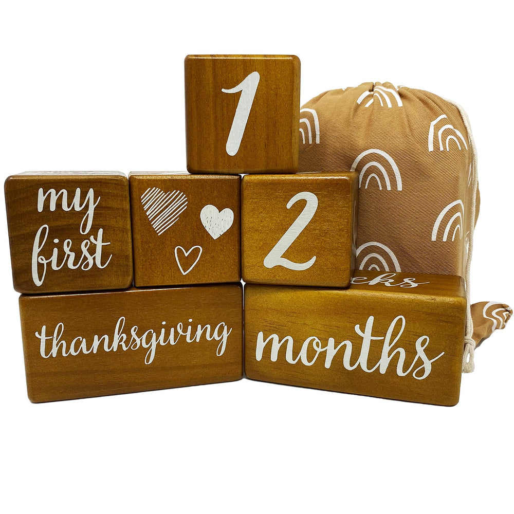 Pondering Pine milestone blocks in natural brown wood, ideal for timeless baby photos.