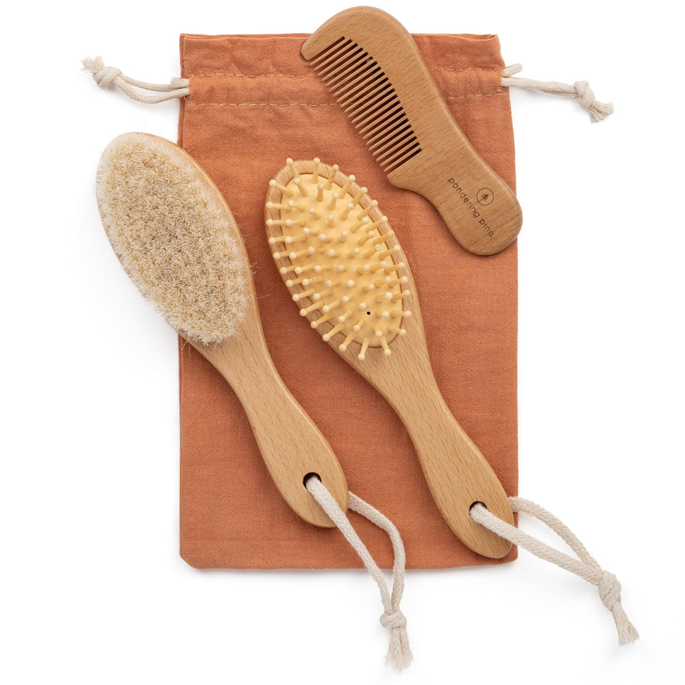 Pondering Pine natural baby brush set wooden brushes for gentle newborn grooming.