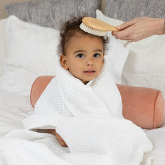Pondering Pine wooden comb for gentle detangling from newborn to toddler.
