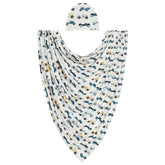Posh Peanut Enzo swaddle blanket in soft viscose for newborn skin comfort.