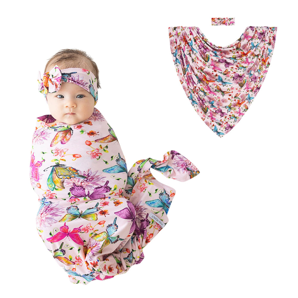 Posh Peanut watercolor butterfly swaddle blanket with matching headband for newborn comfort.