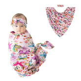 Posh Peanut watercolor butterfly swaddle blanket with matching headband for newborn comfort.