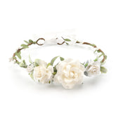 PoshMyra pink flower crown for babies with adjustable fit.
