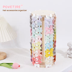 POVETIRE hair bow holder close-up shows polished surface and soft accents for gentle storage.