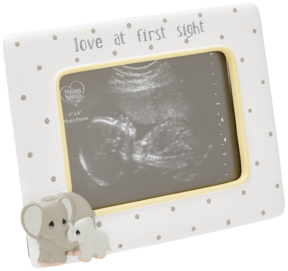 Precious Moments elephant ultrasound frame for first baby photo keepsake.