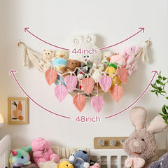 Pretty Jolly hammock tassels and leaf patterns decorate the wall