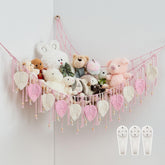 Pretty Jolly macrame hammock front view keeps plush toys neatly organized.