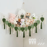 Pretty Jolly stuffed animal hammock close-up shows decorative leaf tassels for charm.