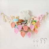 Pretty Jolly stuffed animal hammock with leaves and moon decor for organized kids' toys