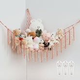 Pretty Jolly stuffed animal storage hammock in corner display for organized toy collection.