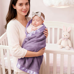 Pro Goleem fleece blanket draped over crib for cozy nursery layering