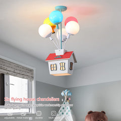 PSXPSXO Cartoon house shape light highlights a cozy bedtime nook.