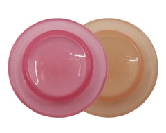 Pura Kiki rose sealing disk in pink keeps bottles airtight for travel.
