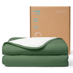 PurComfy Supersoft Toddler Comforter laid flat, covering a sleeper from toes to chin