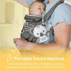 PureEnrichment PureBaby Koala portable sleep aid attached to stroller