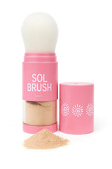 Pure Sol Sol Brush SPF50 sunscreen application for quick, mess-free facial protection outdoors.