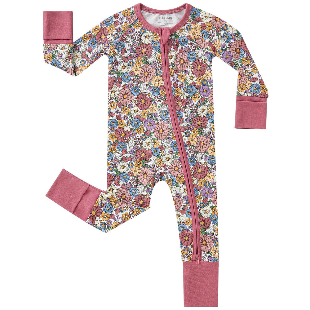 Pureborn baby girls sleeper with daisy pattern for soft, cozy nights.