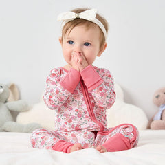Reversible mittens protect tiny hands while sleeping.
