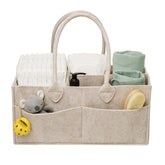 PUTSKA diaper caddy-darkmocha-xl in nursery decor keeps diapers and wipes within reach.