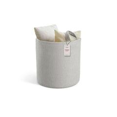 PUTSKA round blanket basket keeps nursery tidy by storing toys.