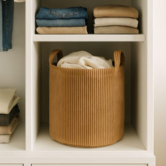 Putska clothes storage basket doubles as a lightweight laundry hamper.