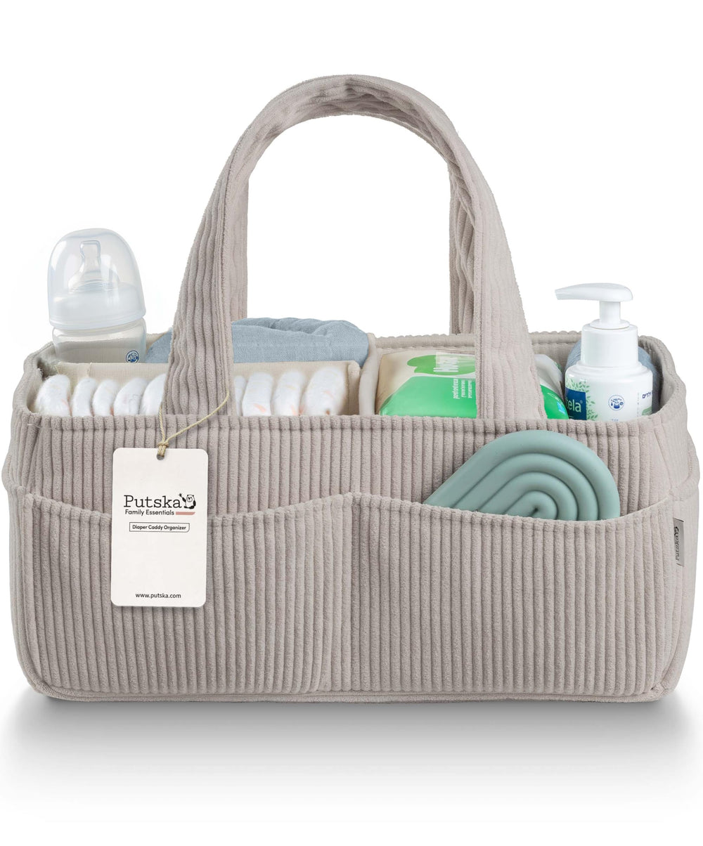 PUTSKA corduroy diaper caddy on changing table for easy wipe access