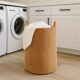 PUTSKA laundry basket front view showing spacious, organized storage.