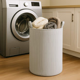 PUTSKA laundry basket in grey corduroy front view for clutter-free spaces.