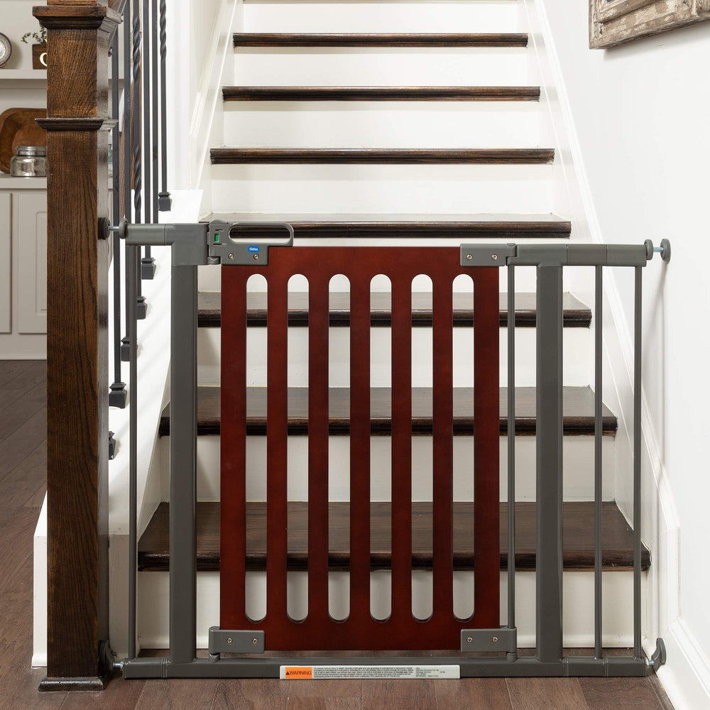 QDOS Safety Spectrum designer gate in mahogany fits openings with a sturdy, stylish finish.
