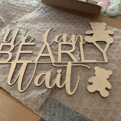 QENWWENG bear themed baby shower decor on the wall adds playful warmth