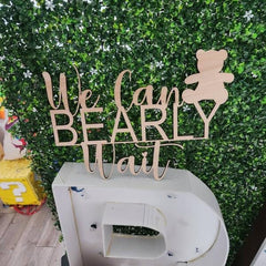 QENWWENG nursery wall decor in natural wood tones enhances the space