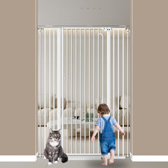 Qonimm 57-inch tall gate guarding a doorway for pets and children.