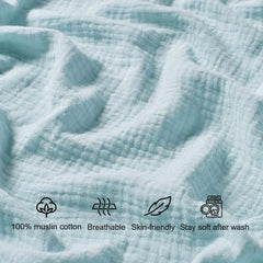 QUENESS muslin crib sheet in light blue adds soft, breathable comfort