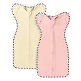 QUENESS Transition Swaddle arm-up cuffs promote secure, restful sleep.