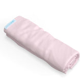 QuickZip crib extra zip-on sheet blush—easy on/off for quick changes.