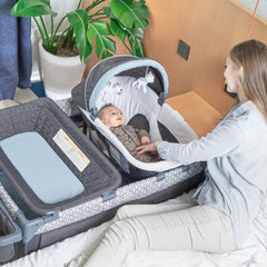 QUTANIX changing table and storage shelf integrated in the unit.