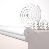 QYV Edge Protector on a table edge cushions bumps and protects furniture.