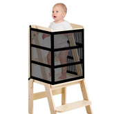 Rainmae safety net installed on toddler learning tower for secure playtime