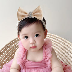 Rannyrena soft tulle headband with crown detail for delicate styling.