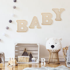 Close-up of Rattan Baby Letters highlights craftsmanship and natural texture