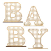 Rattan Baby Letters table centerpiece adds boho charm to a nursery