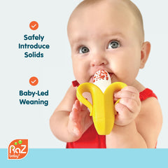 Ergonomic, easy-to-hold Razbaby Fruitique feeder for tiny hands during snack time.