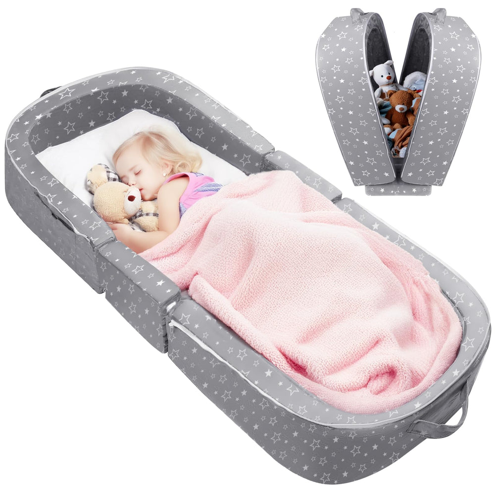 REAWUL foldable toddler bed open, showcasing integrated safety rails for secure sleep