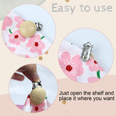 REDANHA pacifier clips arranged for on-the-go use in a baby bag.