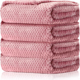 Reginary 4-pack fuzzy blankets in pink with waffle pattern for cozy newborn warmth.