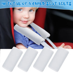 Close-up of Riakrum stroller seatbelt cover on white strap.