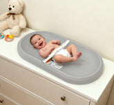 ROGSOUTH baby changing pad top view highlights contoured shape for secure diaper changes