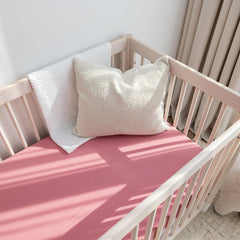 ROMY RO muslin crib sheet shows breathable design supporting airy bedtime routines.