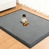 RONGFA baby play mat with memory foam padding for cushioned tummy time on hard floors.