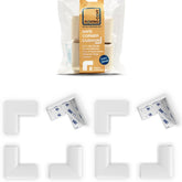 Roving Cove Slim-Fit corner protector on furniture edge, eight-piece baby-proofing set.